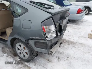 2005 Toyota Prius with VIN JTDKB20U353091661, listed as a IAAI auction lot 41566479 with 148,854 mi miles. Bid and sale history available at carsss.com. Image 6.