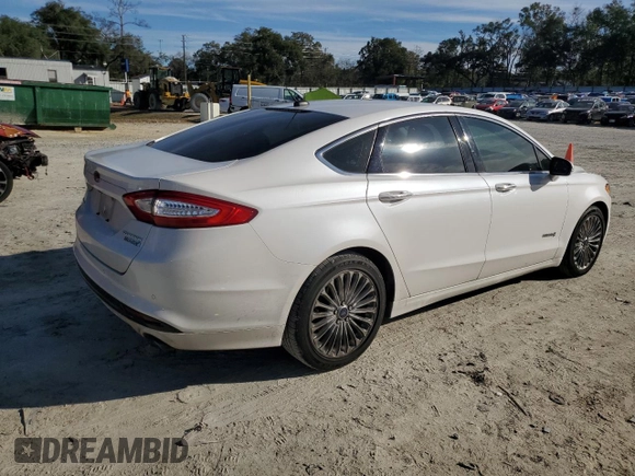 2013 Ford Fusion Titanium Hybrid with VIN 3FA6P0RU2DR277773, listed as a Copart auction lot 85990424 with 215,289 mi miles and Non Repairable. Bid and sale history available at DreamBid. Image 3.