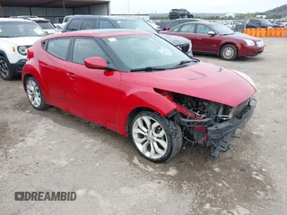 2013 Hyundai Veloster w/Gray Int z VIN KMHTC6AD8DU146035, wystawiony jako IAAI lot #41892703 z przebiegiem 241 169 mil mil oraz . Historia ofert i sprzedaży dostępna na DreamBid. Obrazek 1.