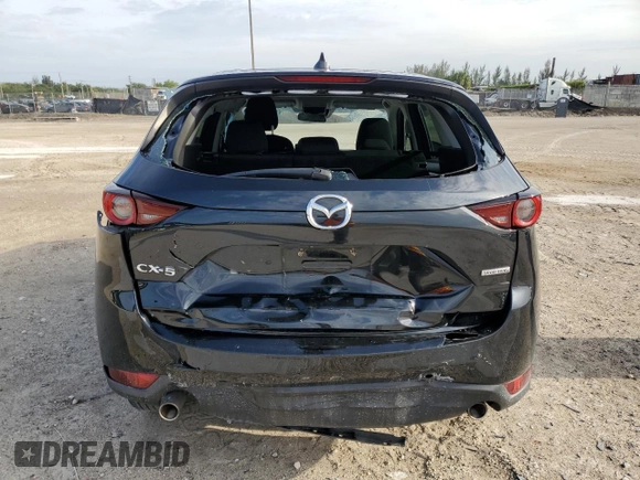 2021 Mazda CX-5 Sport with VIN JM3KFABM9M0301909, listed as a Copart auction lot 52188175 with 73,607 mi miles and Non Repairable. Bid and sale history available at carsss.com. Image 6.
