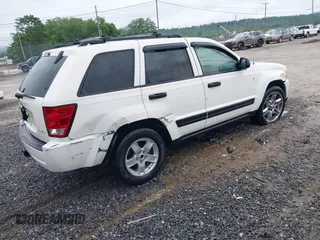 2005 Jeep Grand Cherokee Laredo with VIN 1J4HR48N45C631950, listed as a IAAI auction lot 42365963 with 146,757 mi miles and . Bid and sale history available at DreamBid. Image 4.