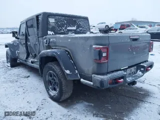 2020 Jeep Gladiator Rubicon with VIN 1C6JJTBG3LL146075, listed as a IAAI auction lot 41048823 with 130,318 mi miles. Bid and sale history available at carsss.com. Image 3.