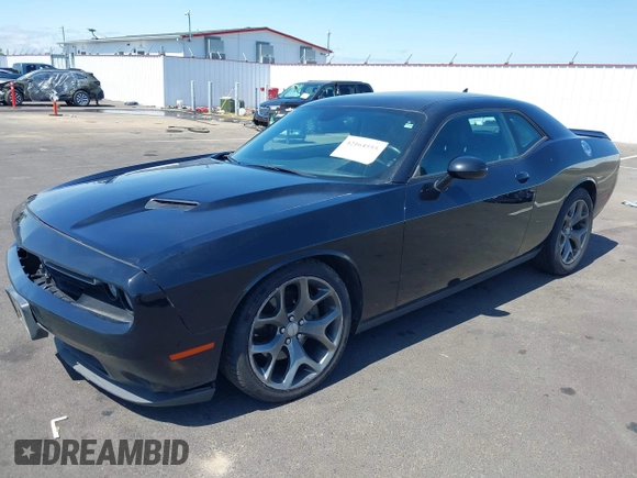 2015 Dodge Challenger SXT Plus with VIN 2C3CDZBGXFH770568, listed as a IAAI auction lot 42164555 with 108,889 mi miles and . Bid and sale history available at DreamBid. Image 2.