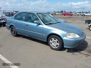 2000 Honda Civic EX with VIN 1HGEJ8641YL042538, listed as a IAAI auction lot 41917496 with 133,999 mi miles. Bid and sale history available at carsss.com. Image 1.