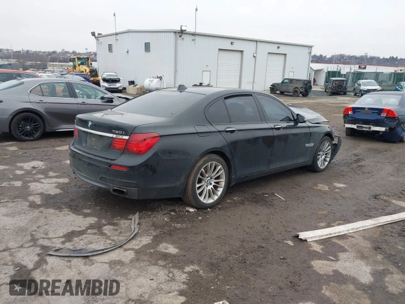 2015 BMW 7 Series 750i xDrive with VIN WBAYB6C59FD965820, listed as a IAAI auction lot 41558215 with 142,617 mi miles. Bid and sale history available at carsss.com. Image 4.