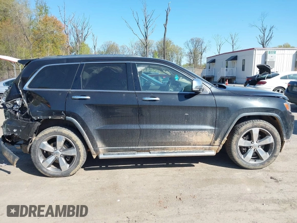 2014 Jeep Grand Cherokee Limited with VIN 1C4RJFBT3EC195354, listed as a IAAI auction lot 42031013 with 168,304 mi miles and . Bid and sale history available at DreamBid. Image 13.