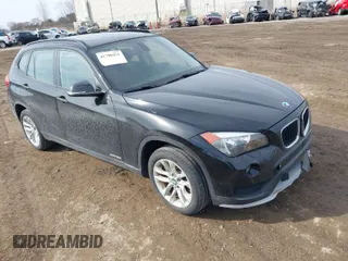 2015 BMW X1 xDrive28i with VIN WBAVL1C5XFVY31542, listed as a IAAI auction lot 41790451 with 66,083 mi miles. Bid and sale history available at carsss.com. Image 1.