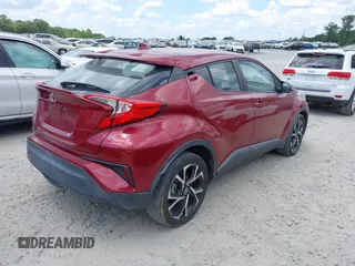 2018 Toyota C-HR XLE with VIN NMTKHMBX6JR054483, listed as a IAAI auction lot 42759739 with 89,820 mi miles and . Bid and sale history available at DreamBid. Image 4.
