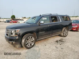 2018 Chevrolet Suburban Premier with VIN 1GNSKJKC0JR315174, listed as a Copart auction lot 58559735 with 121,750 mi miles and Salvage title. Bid and sale history available at DreamBid. Image 1.