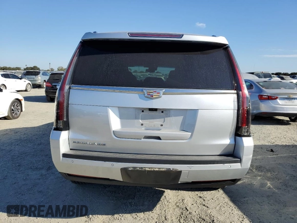 2020 Cadillac Escalade Luxury z VIN 1GYS4BKJ2LR127115, wystawiony jako Copart lot #70709034 z przebiegiem 88 210 mil mil oraz Szkoda całkowita • Salvage title. Historia ofert i sprzedaży dostępna na DreamBid. Obrazek 6.