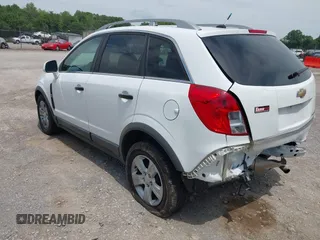 2014 Chevrolet Captiva Sport LS z VIN 3GNAL2EK2ES621832, wystawiony jako IAAI lot #42246539 z przebiegiem 73 788 mil mil oraz . Historia ofert i sprzedaży dostępna na DreamBid. Obrazek 3.