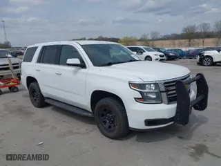 2020 Chevrolet Tahoe Commercial with VIN 1GNSKDEC9LR260983, listed as a IAAI auction lot 42062097 with 124,911 mi miles. Bid and sale history available at carsss.com. Image 1.