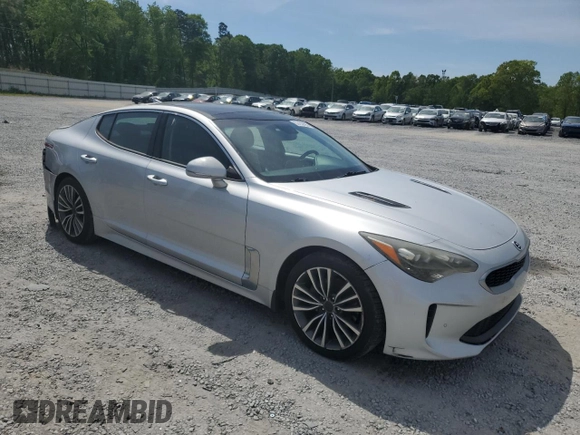 2018 Kia Stinger Premium with VIN KNAE25LAXJ6017479, listed as a Copart auction lot 53158595 with 120,273 mi miles and Salvage Title. Bid and sale history available at DreamBid. Image 4.