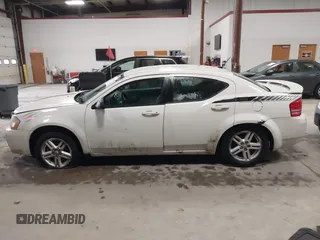 2008 Dodge Avenger SXT with VIN 1B3LC56K98N282097, listed as a IAAI auction lot 41380832 with 220,631 mi miles. Bid and sale history available at carsss.com. Image 14.