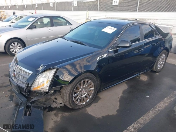 2011 Cadillac CTS Sedan with VIN 1G6DA5EY0B0135351, listed as a IAAI auction lot 41433130 with 111,120 mi miles. Bid and sale history available at carsss.com. Image 2.