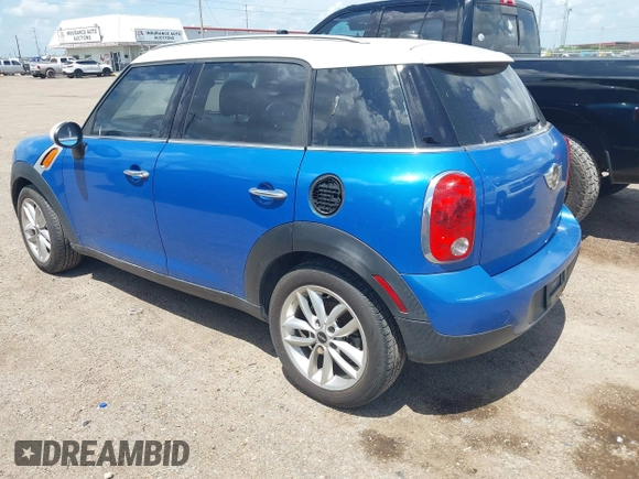 2014 MINI Countryman with VIN WMWZB3C52EWR40215, listed as a IAAI auction lot 42687571 with 106,338 mi miles and . Bid and sale history available at DreamBid. Image 3.