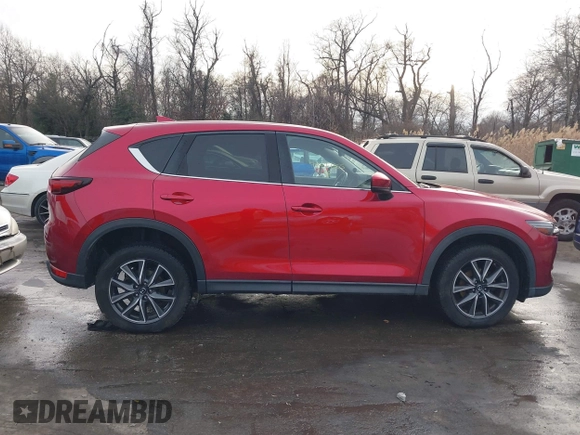 2018 Mazda CX-5 Grand Touring with VIN JM3KFBDM8J0406276, listed as a IAAI auction lot 41447355 with 70,772 mi miles. Bid and sale history available at carsss.com. Image 13.