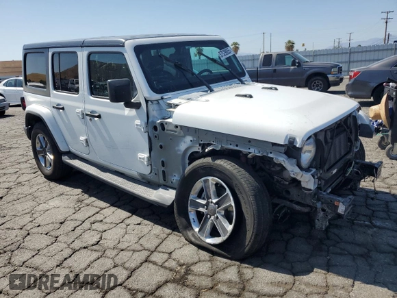 2019 Jeep Wrangler Unlimited Sahara с VIN 1C4HJXEN4KW593522, выставлен на аукционе Copart как лот 57528955 с пробегом 77 382 миль миль и Списание • Salvage title. История ставок и продаж доступна на DreamBid. Изображение 4.