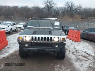 2003 Hummer H2 with VIN 5GRGN23UX3H106356, listed as a IAAI auction lot 41185603 with Not Provided miles. Bid and sale history available at carsss.com. Image 12.