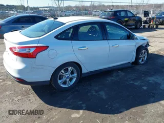 2014 Ford Focus SE with VIN 1FADP3F21EL119923, listed as a IAAI auction lot 41585170 with 126,266 mi miles. Bid and sale history available at carsss.com. Image 4.