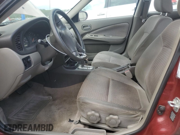 2004 Nissan Sentra S z VIN 3N1CB51D44L920389, wystawiony jako Copart lot #54788315 z przebiegiem 178 674 mil mil oraz Szkoda całkowita • Salvage title. Historia ofert i sprzedaży dostępna na DreamBid. Obrazek 7.