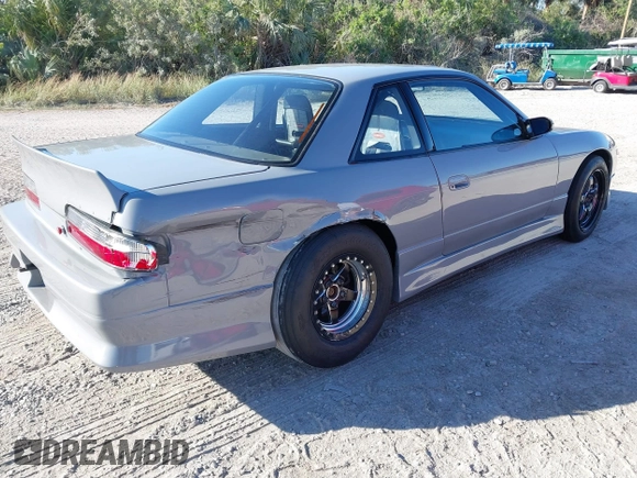 1992 Nissan 240SX z VIN JN1MS34P9NW100593, wystawiony jako IAAI lot #40867667 z przebiegiem Nie podano mil oraz . Historia ofert i sprzedaży dostępna na DreamBid. Obrazek 4.