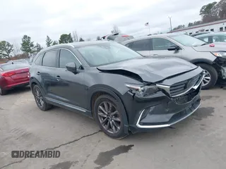 2016 Mazda CX-9 Grand Touring with VIN JM3TCADY4G0111310, listed as a IAAI auction lot 41532851 with 178,907 mi miles and . Bid and sale history available at DreamBid. Image 1.