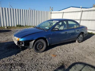 2002 Saturn SL with VIN 1G8ZF52882Z206326, listed as a Copart auction lot 77197844 with 105,810 mi miles and Salvage Title. Bid and sale history available at carsss.com. Image 1.