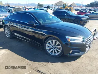 2018 Audi A5 Sportback Premium z VIN WAUANCF53JA009200, wystawiony jako IAAI lot #41725501 z przebiegiem 107 076 mil mil oraz . Historia ofert i sprzedaży dostępna na DreamBid. Obrazek 1.