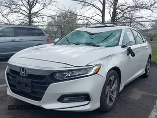 2018 Honda Accord EX-L z VIN 1HGCV1F52JA084570, wystawiony jako IAAI lot #41956686 z przebiegiem 87 683 mil mil oraz . Historia ofert i sprzedaży dostępna na DreamBid. Obrazek 2.
