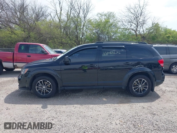 2018 Dodge Journey SE with VIN 3C4PDCAB7JT529454, listed as a IAAI auction lot 42066676 with 89,404 mi miles and . Bid and sale history available at carsss.com. Image 14.