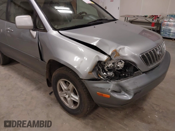 2002 Lexus RX with VIN JTJHF10U020292307, listed as a IAAI auction lot 41703412 with 221,843 mi miles and . Bid and sale history available at carsss.com. Image 6.