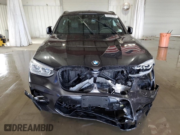 2020 BMW X4 M Competition z VIN 5YMUJ0C05L9B44115, wystawiony jako Copart lot #55556755 z przebiegiem Nie podano mil oraz Szkody całkowita. Historia ofert i sprzedaży dostępna na DreamBid. Obrazek 5.