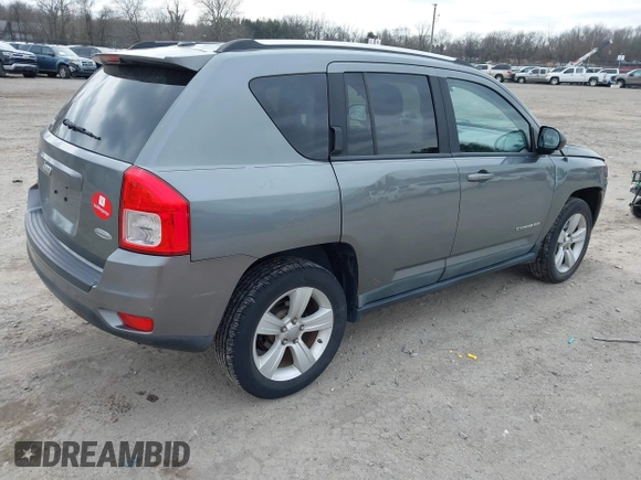 2011 Jeep Compass with VIN 1J4NF1FB1BD251618, listed as a IAAI auction lot 41633368 with 125,326 mi miles. Bid and sale history available at carsss.com. Image 4.