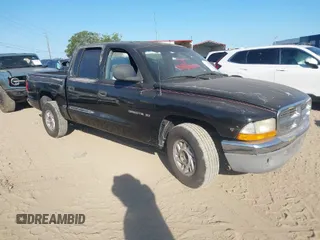 2000 Dodge Dakota Sport with VIN 1B7GL2AN2YS776819, listed as a IAAI auction lot 42066658 with 250,880 mi miles. Bid and sale history available at carsss.com. Image 1.