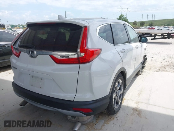 2019 Honda CR-V EX-L with VIN 5J6RW1H84KA029580, listed as a IAAI auction lot 41729799 with 115,372 mi miles. Bid and sale history available at carsss.com. Image 4.