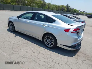 2017 Ford Fusion Hybrid SE с VIN 3FA6P0LU5HR285381, выставлен на аукционе IAAI как лот 42597789 с пробегом 129 662 миль миль и . История ставок и продаж доступна на DreamBid. Изображение 3.