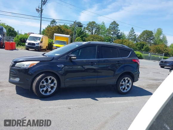 2015 Ford Escape Titanium с VIN 1FMCU0JX5FUB87813, выставлен на аукционе IAAI как лот 42035295 с пробегом 148 430 миль миль и . История ставок и продаж доступна на DreamBid. Изображение 14.