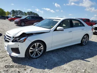 2014 Mercedes-Benz E 350 Sport with VIN WDDHF5KB8EA828799, listed as a Copart auction lot 52600805 with 113,755 mi miles and Salvage Title. Bid and sale history available at DreamBid. Image 1.