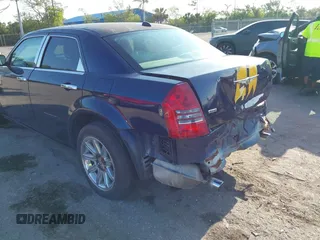 2005 Chrysler 300 300C AWD z VIN 2C3AK63H05H672425, wystawiony jako IAAI lot #42224241 z przebiegiem 143 185 mil mil oraz . Historia ofert i sprzedaży dostępna na DreamBid. Obrazek 13.