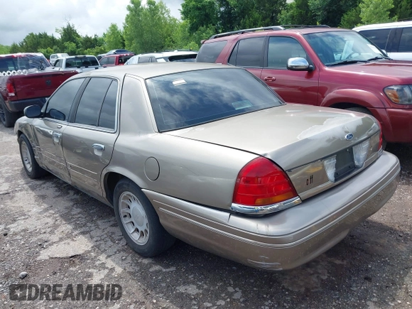 2002 Ford Crown Victoria LX z VIN 2FAFP74W52X112493, wystawiony jako IAAI lot #42197164 z przebiegiem 103 941 mil mil oraz . Historia ofert i sprzedaży dostępna na DreamBid. Obrazek 3.