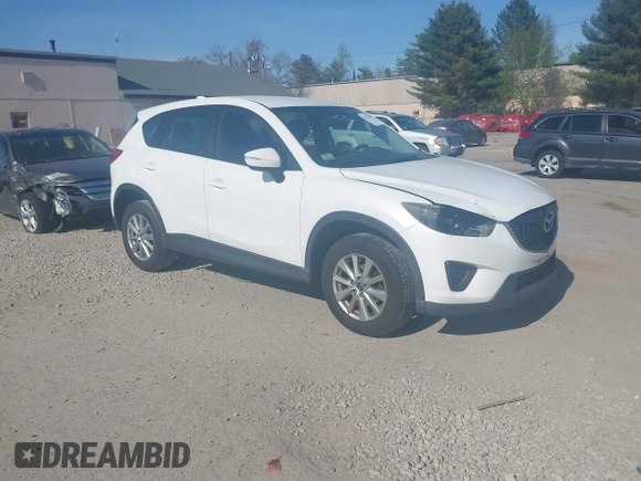 2015 Mazda CX-5 Sport with VIN JM3KE4BY3F0495511, listed as a IAAI auction lot 42170968 with 206,217 mi miles and . Bid and sale history available at carsss.com. Image 1.