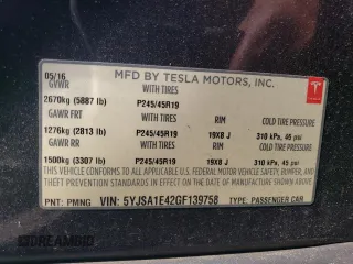 2016 Tesla Model S 90D with VIN 5YJSA1E42GF139758, listed as a Copart auction lot 63077255 with 78,235 mi miles and Salvage title. Bid and sale history available at DreamBid. Image 12.