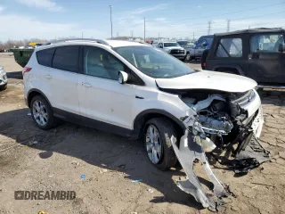 2016 Ford Escape Titanium with VIN 1FMCU0JX3GUB14361, listed as a Copart auction lot 49356585 with 122,409 mi miles and Clean Title. Bid and sale history available at carsss.com. Image 4.