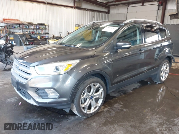 2019 Ford Escape Titanium with VIN 1FMCU9J97KUC55772, listed as a IAAI auction lot 42514001 with 77,737 mi miles and . Bid and sale history available at DreamBid. Image 2.