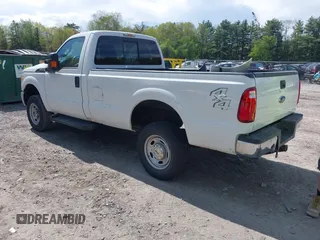2014 Ford F-250 XL with VIN 1FTBF2B61EEA36052, listed as a IAAI auction lot 41936441 with 65,916 mi miles and . Bid and sale history available at DreamBid. Image 3.