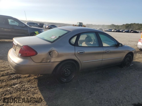 2003 Ford Taurus z VIN 1FAFP52253A170456, wystawiony jako Copart lot #70009824 z przebiegiem 216 567 mil mil oraz Szkoda całkowita • Salvage title. Historia ofert i sprzedaży dostępna na DreamBid. Obrazek 3.
