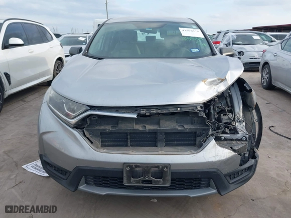2018 Honda CR-V LX with VIN 2HKRW6H37JH213670, listed as a IAAI auction lot 41596374 with 96,105 mi miles. Bid and sale history available at carsss.com. Image 6.