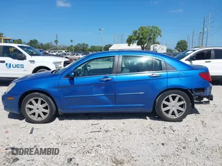 2007 Chrysler Sebring Limited with VIN 1C3LC66M07N550480, listed as a IAAI auction lot 41964858 with 105,316 mi miles and . Bid and sale history available at DreamBid. Image 14.