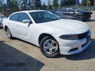 2022 Dodge Charger SXT with VIN 2C3CDXBG4NH197301, listed as a IAAI auction lot 42053688 with 60,592 mi miles and . Bid and sale history available at DreamBid. Image 1.
